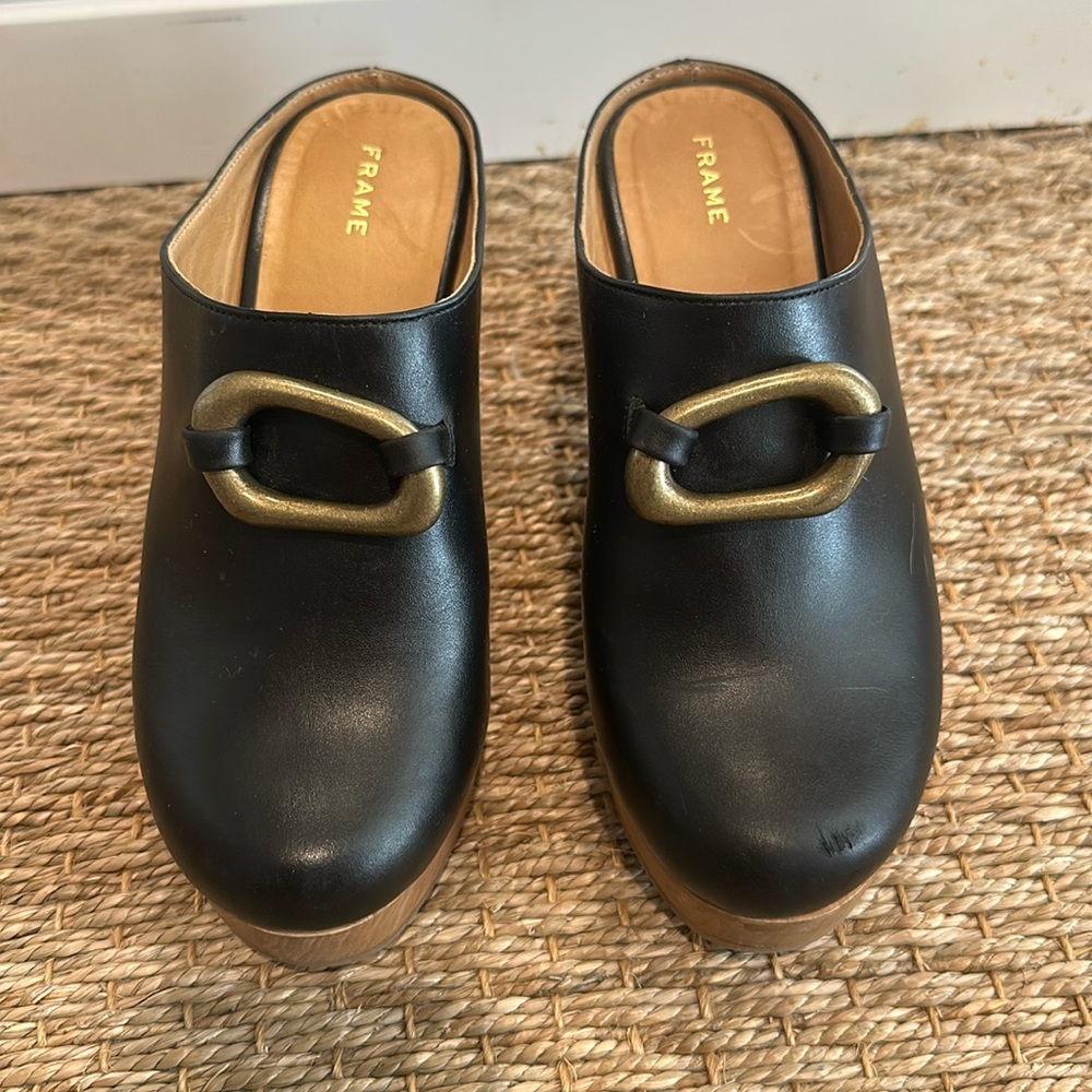 FRAME Le Ione black leather clog with brass accent